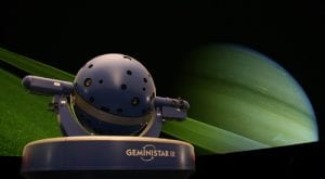 The Konica Minolta GeminiStar III The Konica Minolta GeminiStar III system projects an image of Saturn onto the planetarium dom. Photo by Evan Reinheimer