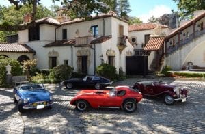 Photo by George Stephani In Vanderbilt Mansion courtyard, from left: 1967 MG, 1966 Jaguar XKE (rear),1965 Cheetah, 1952 MG TD