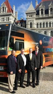 At the State Capitol in Albany: Assemblyman Andrew Raia, Bob Keller of National Grid Foundation, Lance Reinheimer of Vanderbilt Museum, and Assemblyman Chad Lupinacci.