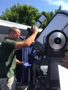 Dave Bush, Planetarium technical coordinator and an astronomy educator, keeps an eye on the Sun Vanderbilt Museum photo.