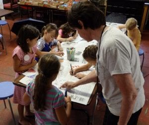 Vanderbilt educator works with children in a creative workshop Vanderbilt Museum photo