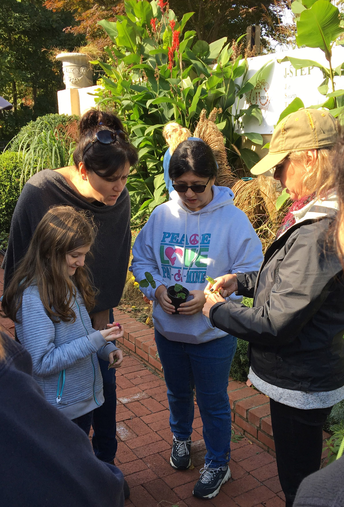 Visitors learn about the Sensory Garden